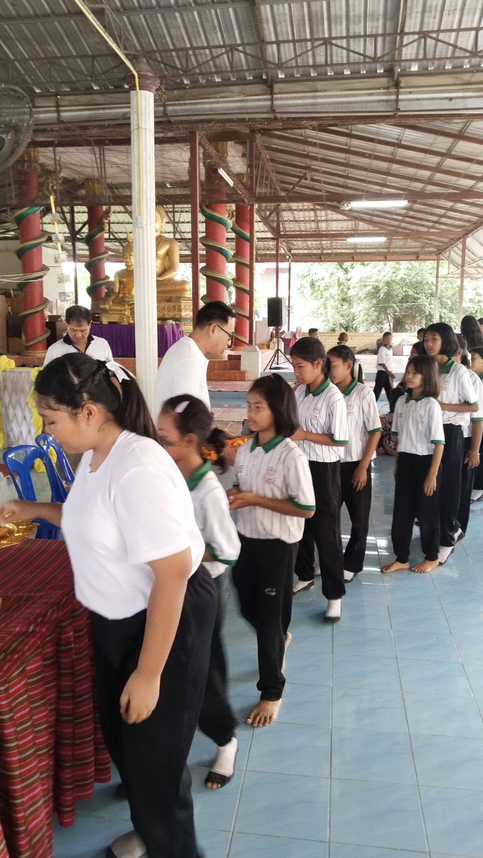โครงการประเพณีแห่ีเทียนและถวายเทียนพรรษาองค์การบริหารส่วนตำบลหนองโดน